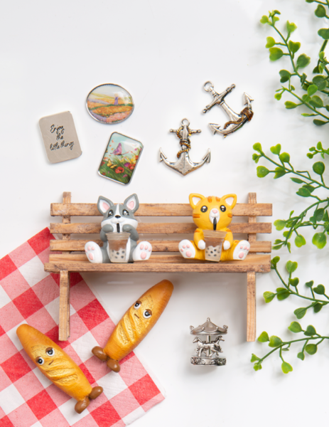 The Carousel of Life Charms in a Basket